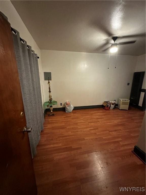 396 Guilford St, Buffalo, NY 14211 - unfurnished room featuring wood finished floors, a ceiling fan, and baseboards