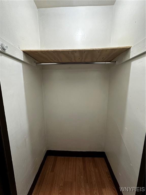 396 Guilford St, Buffalo, NY 14211 - spacious closet with dark wood-style flooring