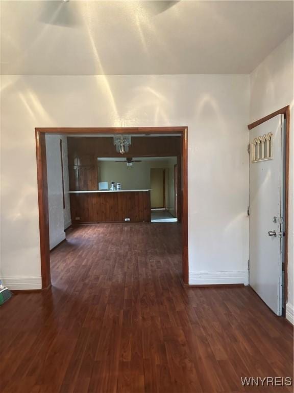 396 Guilford St, Buffalo, NY 14211 - empty room featuring baseboards and dark wood-style flooring
