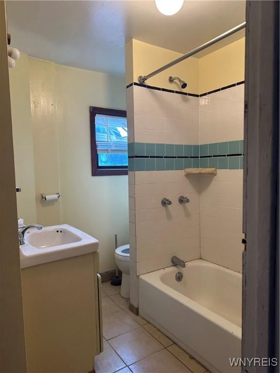 396 Guilford St, Buffalo, NY 14211 - full bath with shower / bathing tub combination, tile patterned floors, vanity, and toilet