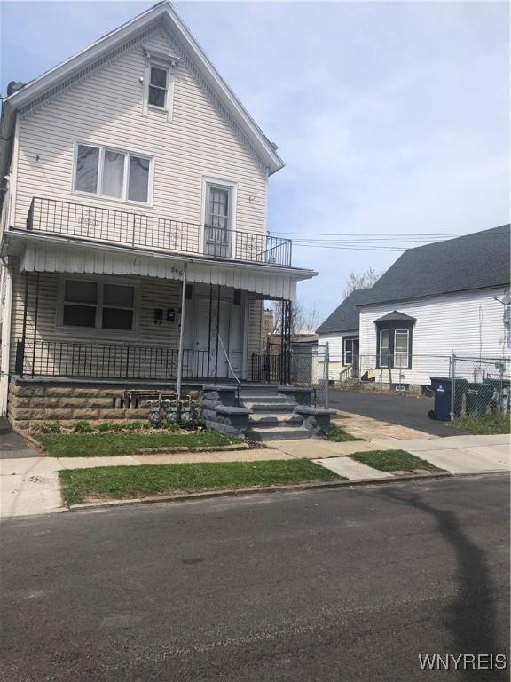 396 Guilford St, Buffalo, NY 14211 - view of front of home featuring a porch and a balcony