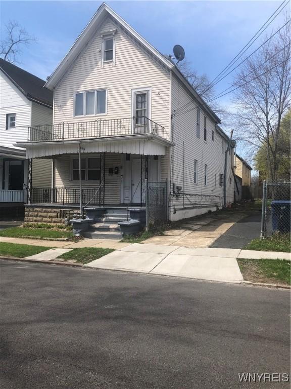 396 Guilford St, Buffalo, NY 14211 - view of front of property featuring a porch and concrete driveway