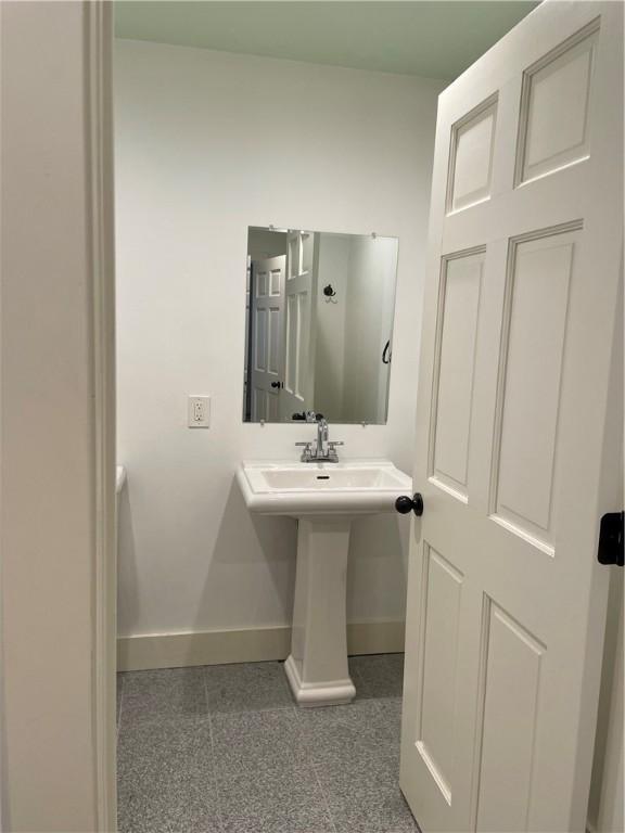 10 Orchard St Unit 8, Urbana, NY 14840 - bathroom with baseboards