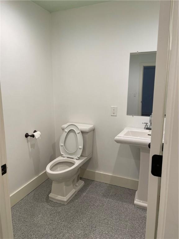 10 Orchard St Unit 8, Urbana, NY 14840 - half bath with toilet and baseboards