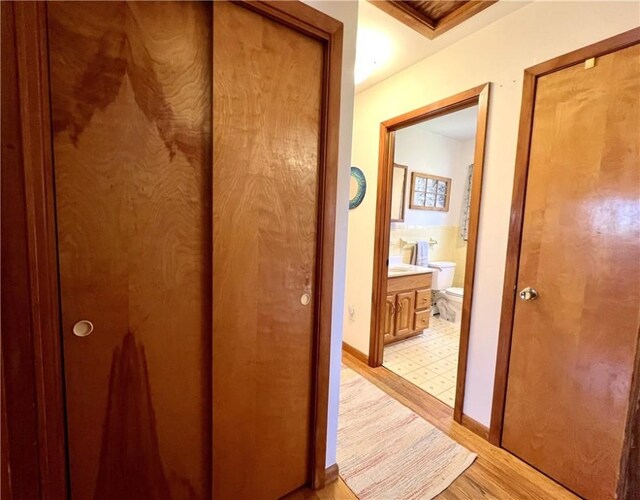 3460 County Road 28, Reading, NY 14891 - corridor with baseboards and light wood-style flooring