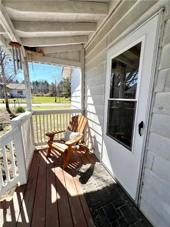 3460 County Road 28, Reading, NY 14891 - wooden terrace featuring covered porch