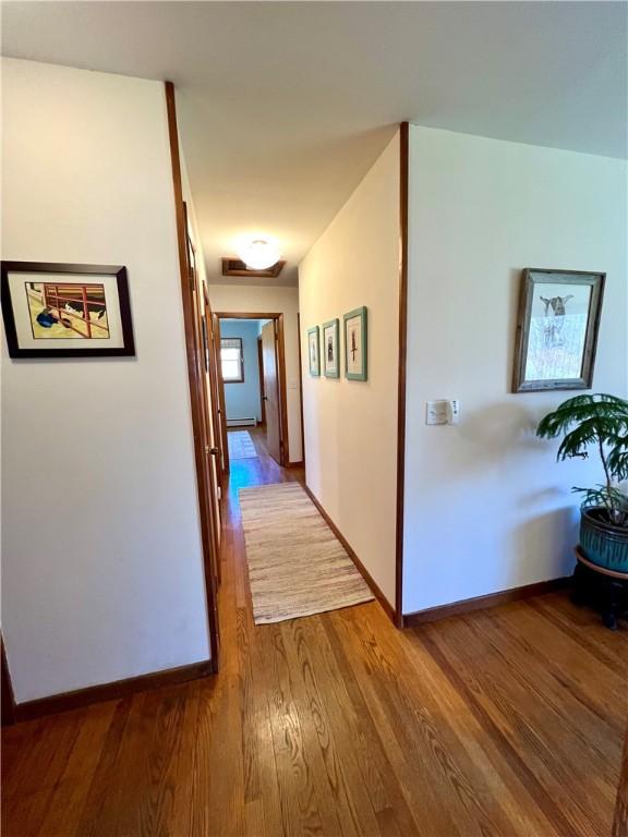 3460 County Road 28, Reading, NY 14891 - hallway featuring baseboards and wood finished floors