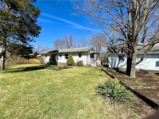 3460 County Road 28, Reading, NY 14891 - view of front facade with a chimney and a front lawn