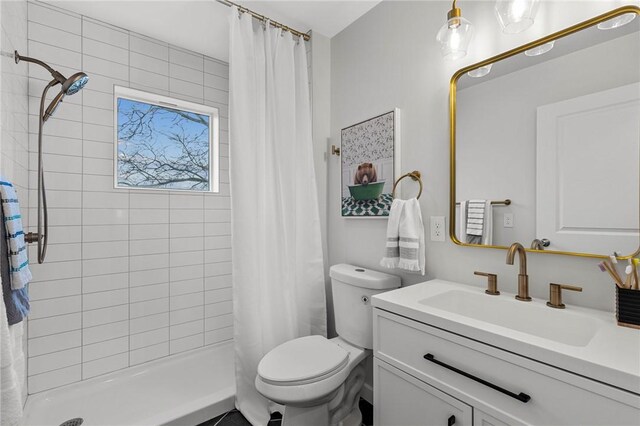 169 S Union St, Rochester, NY 14607 - full bathroom with a shower stall, toilet, and vanity