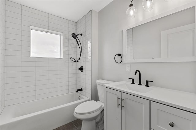 full bathroom featuring toilet, vanity, and shower / tub combination