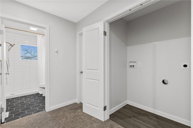 clothes washing area featuring baseboards, laundry area, hookup for an electric dryer, and hookup for a washing machine