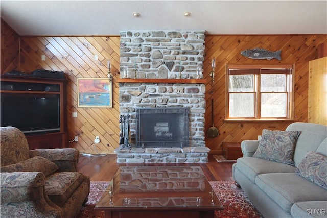 14 Renshaw Bay Rd, Sandy Creek, NY 13145 - living area featuring a fireplace, wooden walls, and wood finished floors