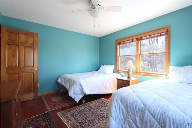 14 Renshaw Bay Rd, Sandy Creek, NY 13145 - bedroom with baseboards, a ceiling fan, and wood finished floors