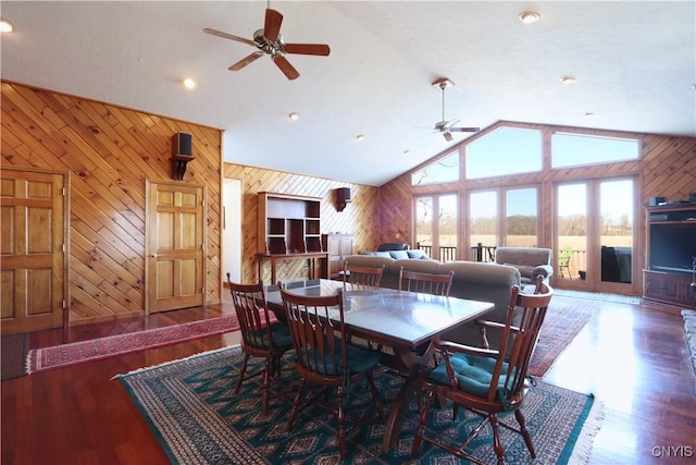 14 Renshaw Bay Rd, Sandy Creek, NY 13145 - dining area featuring high vaulted ceiling, wood finished floors, wooden walls, ceiling fan, and recessed lighting