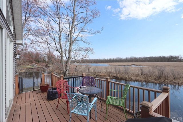 14 Renshaw Bay Rd, Sandy Creek, NY 13145 - wooden terrace with a water view