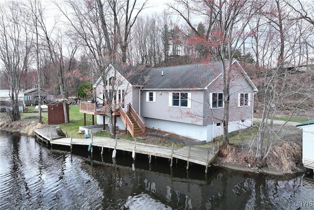 14 Renshaw Bay Rd, Sandy Creek, NY 13145 - rear view of property featuring a deck with water view, roof with shingles, and stairs