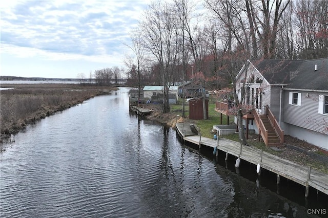 14 Renshaw Bay Rd, Sandy Creek, NY 13145 - dock area featuring a deck with water view and stairway