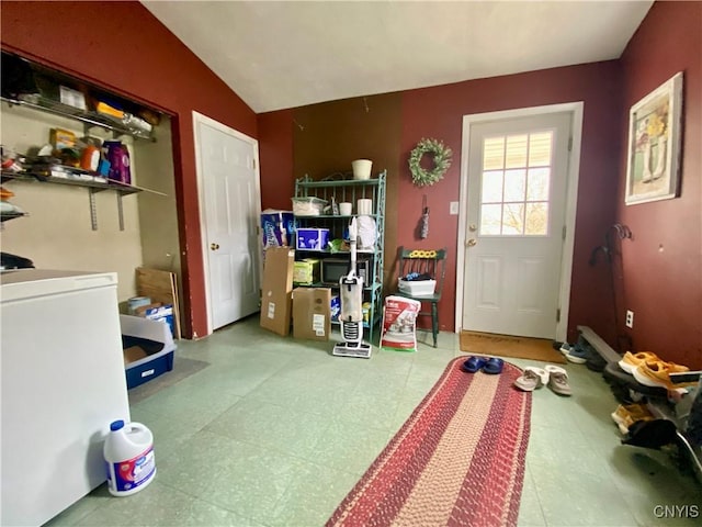 interior space featuring tile patterned floors and laundry area