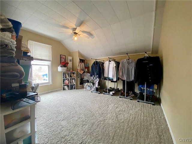 bonus room featuring a ceiling fan, baseboards, lofted ceiling, and carpet flooring