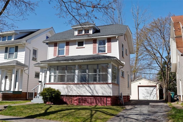 171 Salina St, Rochester, NY 14619 - traditional style home featuring aphalt driveway, roof with shingles, an outbuilding, a sunroom, and a garage