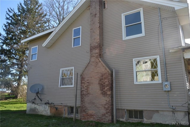2386 Main St, Collins, NY 14034 - view of side of home with a yard