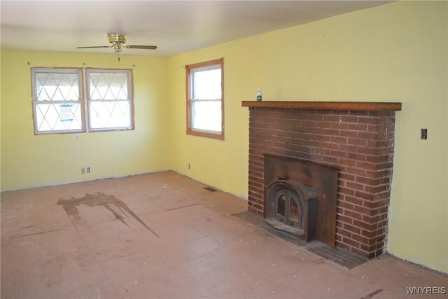 2386 Main St, Collins, NY 14034 - unfurnished living room with a brick fireplace and a ceiling fan
