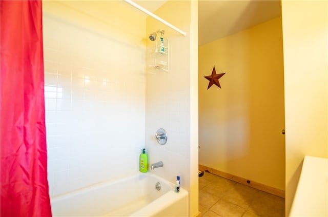 bathroom featuring tile patterned flooring and shower / bath combo