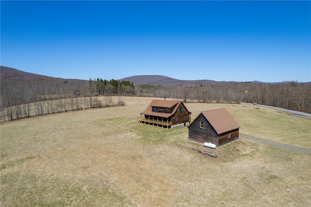 birds eye view of property with a mountain view and a rural view