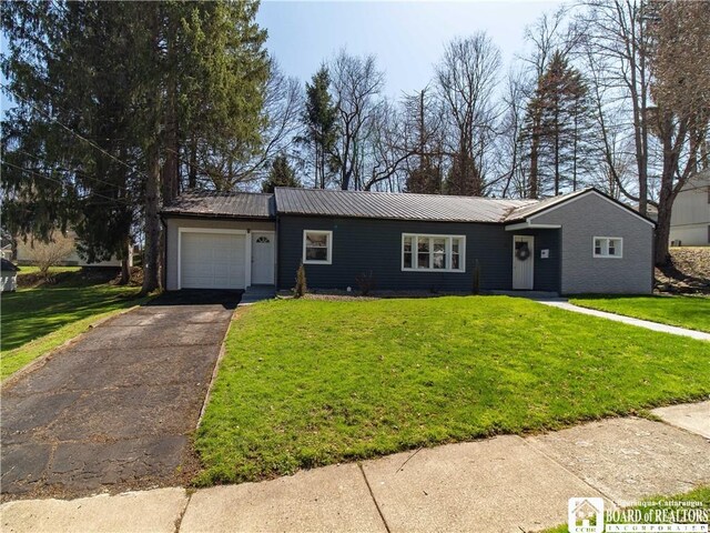 42 Campbell Ave, Jamestown, NY 14701 - ranch-style home featuring a garage, aphalt driveway, a front yard, and metal roof