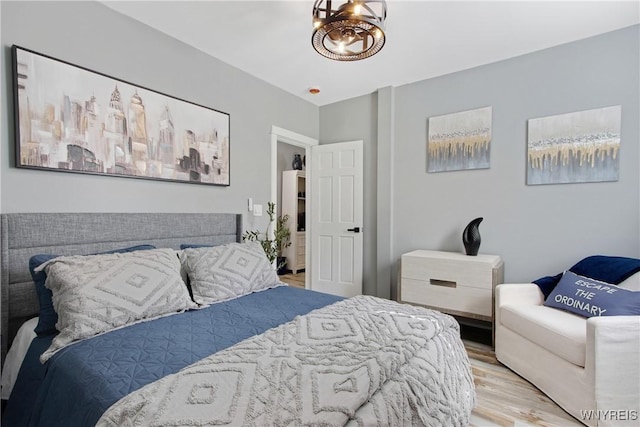 bedroom with wood finished floors