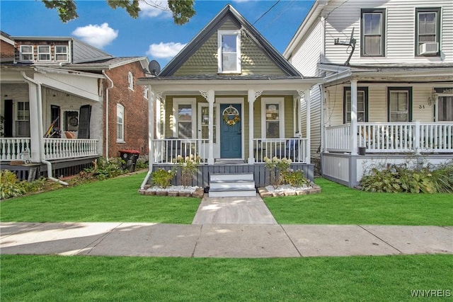 view of front of home with cooling unit, a front lawn, and covered porch