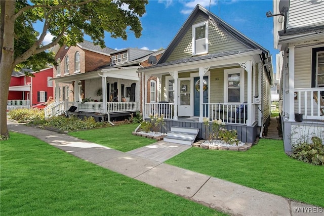 view of front of home with a front lawn and a porch