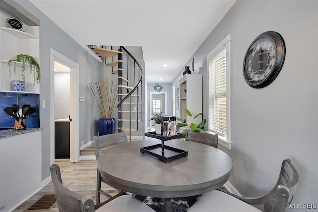 dining space with recessed lighting, stairway, visible vents, light wood-style floors, and baseboards