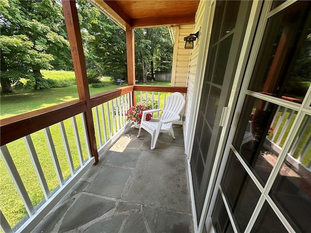 balcony featuring a porch