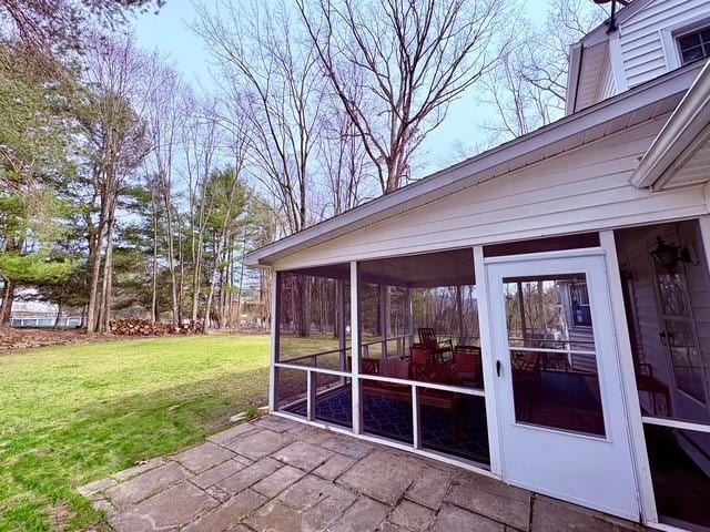 exterior space with a sunroom