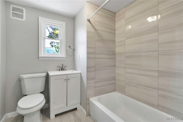 bathroom featuring toilet, baseboards, visible vents, shower / bath combination, and vanity