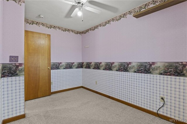 2842 Braley Rd, Wilson, NY 14131 - carpeted empty room with ceiling fan