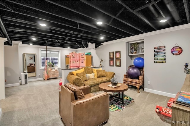 living room featuring light colored carpet, baseboards, and crown molding