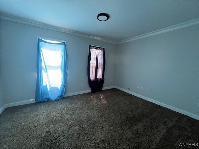 180 Spalding St, Lockport-City, NY 14094 - empty room with baseboards, ornamental molding, and dark colored carpet