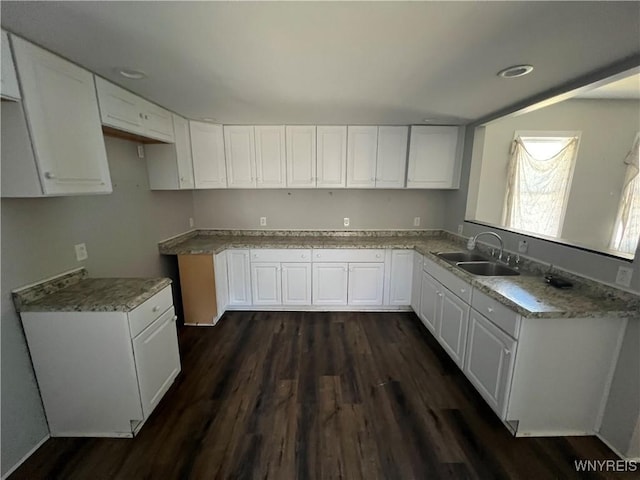 180 Spalding St, Lockport-City, NY 14094 - kitchen featuring white cabinets, dark wood finished floors, and a sink