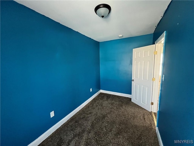 180 Spalding St, Lockport-City, NY 14094 - spare room with dark carpet and baseboards