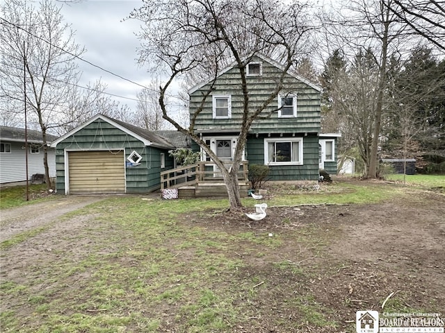 view of front of home featuring driveway and a garage