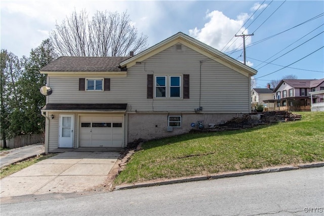 620 W St, Wilna, NY 13619 - view of front of home featuring a garage, driveway, a front yard, and fence