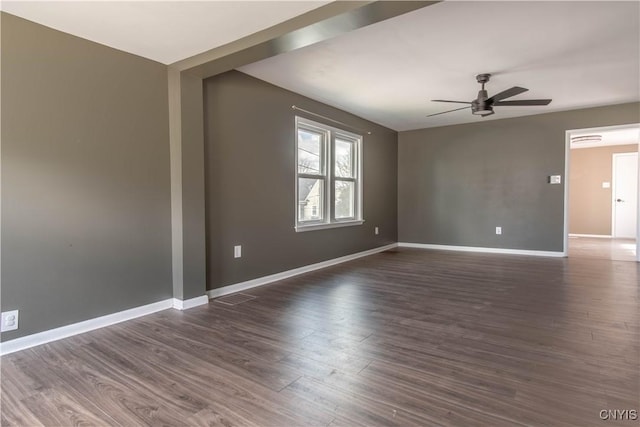 620 W St, Wilna, NY 13619 - spare room with baseboards, a ceiling fan, and dark wood-type flooring