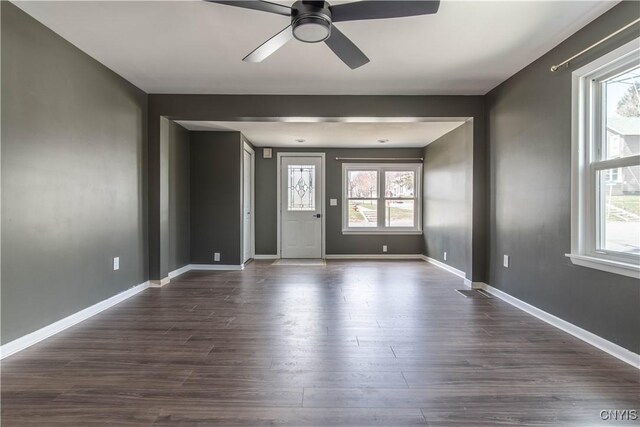 620 W St, Wilna, NY 13619 - interior space featuring dark wood-type flooring, a healthy amount of sunlight, and ceiling fan