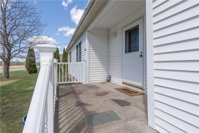 739 Pre Emption Rd, Geneva-City, NY 14456 - doorway to property featuring a lawn