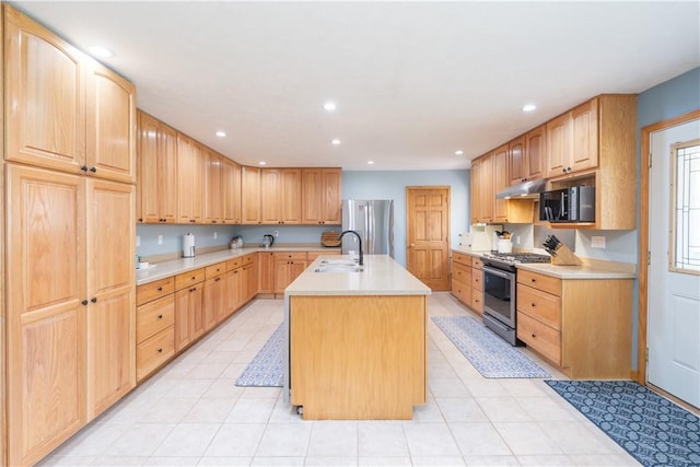 739 Pre Emption Rd, Geneva-City, NY 14456 - kitchen with stainless steel appliances, a sink, light countertops, under cabinet range hood, and an island with sink