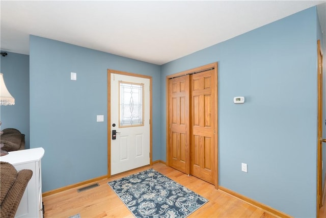 739 Pre Emption Rd, Geneva-City, NY 14456 - entrance foyer with light wood-style flooring, visible vents, and baseboards