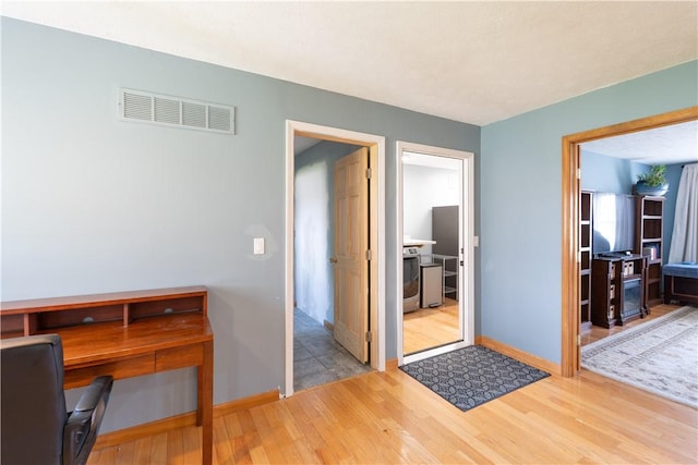 739 Pre Emption Rd, Geneva-City, NY 14456 - office space with baseboards, wood finished floors, and visible vents