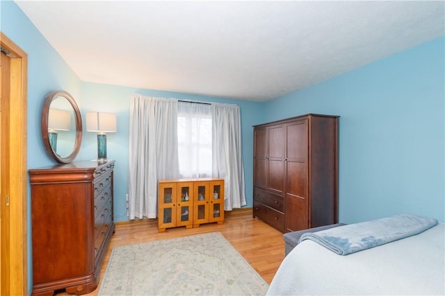 739 Pre Emption Rd, Geneva-City, NY 14456 - bedroom with light wood-style flooring